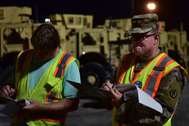 U.S. Army Sgt. 1st Class Will Twigg, an Operations NCOIC mobilized with the 841st Transportation Battalion, oversees equipment being offloaded from a cargo vessel to ensure all equipment is accounted for, at Joint Base Charleston’s Naval Weapons...