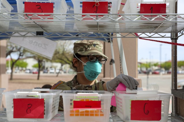 A U.S. Army Pharmacy Specialist prepares to dispense patient’s prescriptions at the William Beaumont Army Medical Center (WBAMC) curbside pharmacy service on Fort Bliss, Texas, April 6, 2020. WBAMC has implemented the new curbside pharmacy...