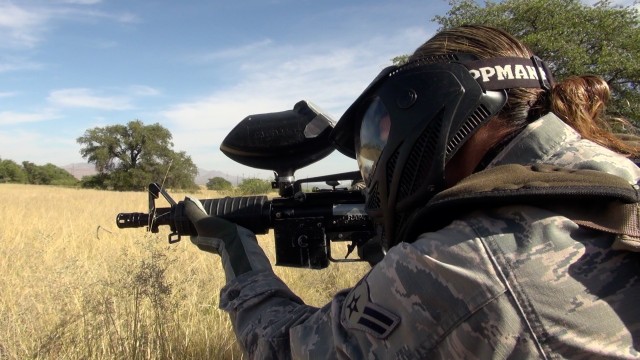 A U.S. Air Force Airman returns fire during a Field Training Exercise part of the U.S. Army Weather Support Course hosted by the 304th Military Intelligence Battalion at Fort Huachuca, Ariz. U.S. Air Force meteorologists attend the course to learn...