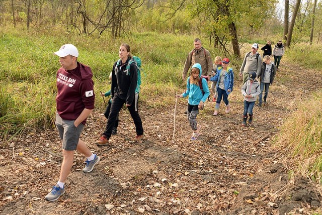 The Ogura and Prokoph families participate in a 2.5-mile hike with Military Wild members Oct. 17 near Sherman Army Airfield. Photo by Prudence Siebert/Fort Leavenworth Lamp