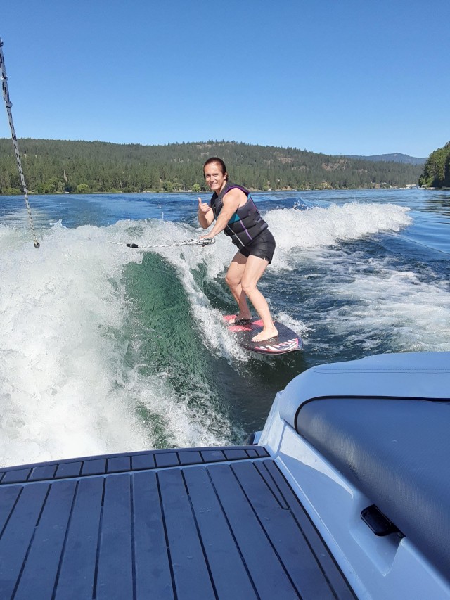 Staff Sgt. Yvonne Estrella tried wake surfing for the first time while assigned to the Joint Base Lewis-McChord Soldier Recovery Unit, Wash. (U.S. Army photo courtesy of Staff Sgt. Yvonne Estrella)