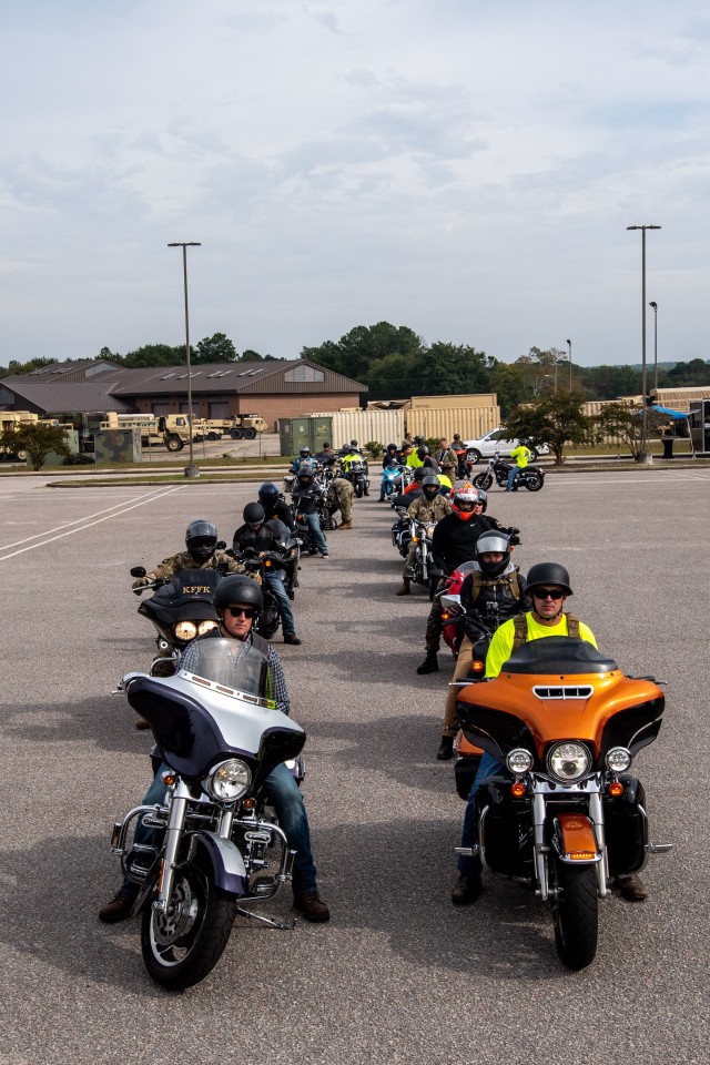 Participants of the Lightening Rodeo line up to start their check ride as part of the Motorcycle Mentorship Program, Oct. 9.