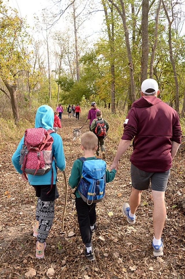 Nine-year-old Josephine, 5-year-old Jordan and dad Maj. David Ogura, Headquarters, Combined Arms Center, participate in a 2.5-mile hike with Military Wild members Oct. 17 near Sherman Army Airfield. Mom/wife Samantha Ogura also participated in the...
