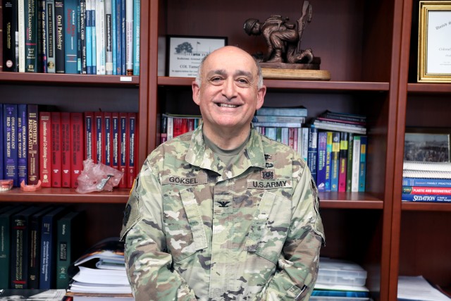 Col. (Dr.) Tom Goksel, an oral maxillofacial surgeon and commander for Dental Health Activity Rheinland Pfalz, poses for a picture.