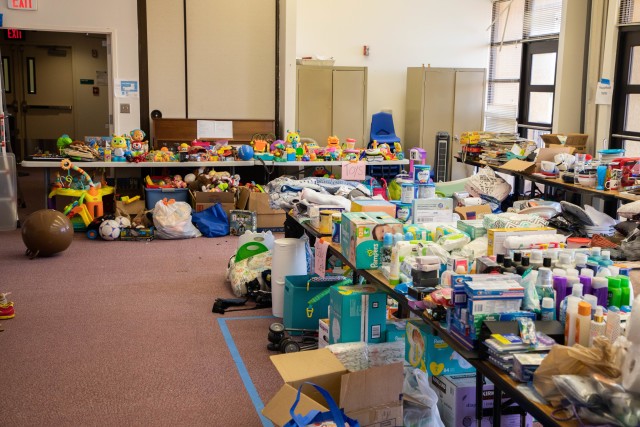 Volunteers collect and sort donations at Impact Chapel to support families who became victims of a home fire on Helemano Military Reservation, Hawaii, Sept. 26, 2020. The fire caused damages ranging from minor smoke damage to complete loss of everything owned and affected a total of six families. (U.S. Army photo by Staff Sgt. Alan Brutus)