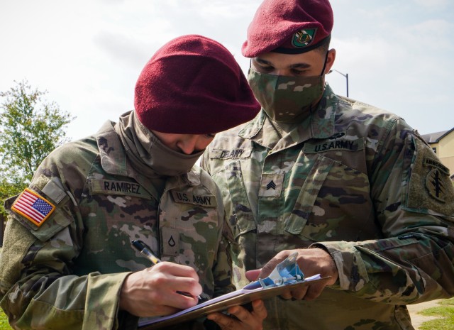 Sgt. Hubert D. Delany, right, a public affairs mass communication specialist assigned to the 3rd Psychological Operations Battalion (Airborne) (Dissemination), helps a fellow Soldier register to vote through the Federal Voting Assistance Program as part of a voting registration drive at Fort Bragg, N.C., on October 13, 2020. The Federal Voting Assistance Program is a non-partisan government program administered by the Defense Department, designed to provide information, resources and tools to make voting easier for troops and family members living at home or abroad. (U.S. Army photo by Sgt. Liem Huynh)