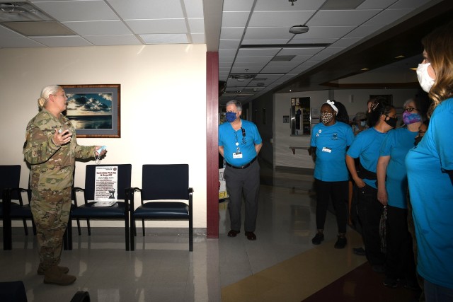 Lt. Col. Charlene A. Wilson, the Raymond W. Bliss Army Health Center Deputy Commander for Nursing, thanks the pharmacy team for their hard work, great attitudes and exceptional care towards patients.
