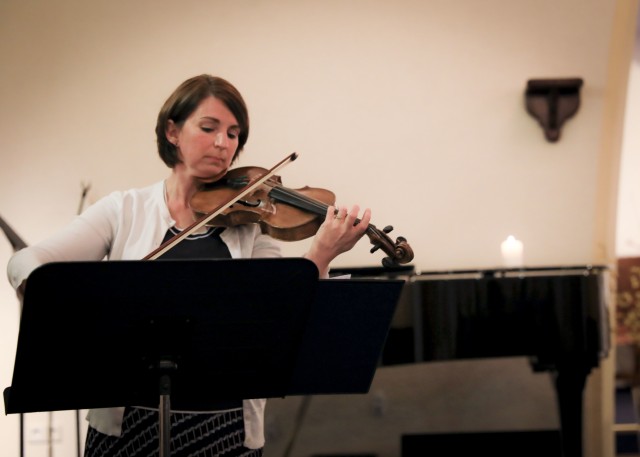 Arian Johnson plays a violin during the Landstuhl Regional Medical Center Pregnancy and Infant Loss Remembrance observance, Oct. 15. The observance is held annually on Oct. 15 to remember pregnancy loss and infant death which includes but not...