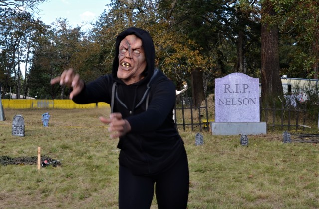 JBLM BOSS volunteers scare guests during a frightfully fun, COVID-friendly Haunted, Crooked Trail event Oct. 24.