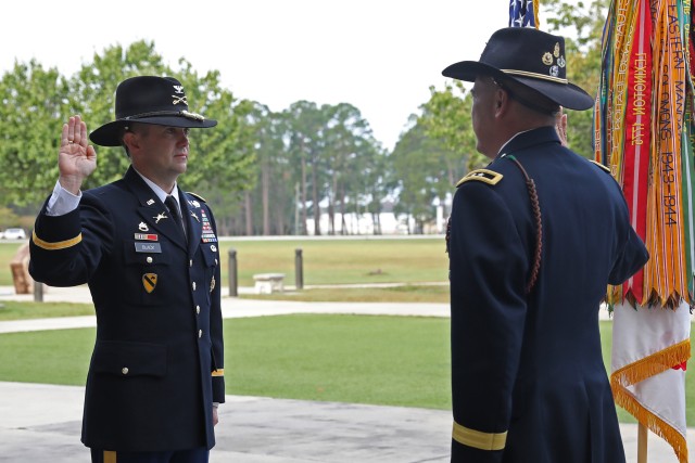 Col. Kevin Black, director of training and operations for 3rd Infantry Division, and Maj. Gen. Antonio A. Aguto, commanding general of 3rd ID, recite the oath of commissioned officers during Black’s promotion ceremony on Oct. 23, 2020, at Fort...