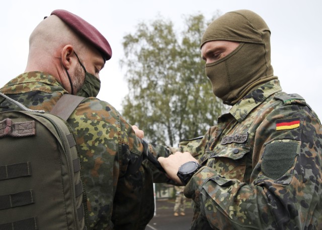 Stefan Troschutz, an instructor with the Bundeswehr (German Armed Forces), checks a tourniquet application on a Bundeswehr Soldier during the International Trauma Combat Casualty Care course at Landstuhl Regional Medical Center, Sept. 30 – Oct. 2. The international course, which included Service Members from four Nations, was aimed at providing unit-level health care providers life-saving instruction to increase survivability at the point of injury.