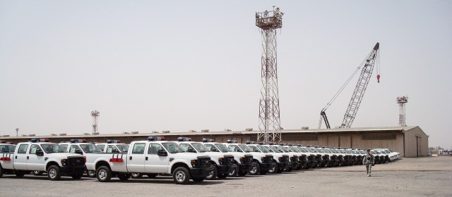 Vehicles lined up for an Iraqi foreign military sales case, from 2008, that Col. Fred Heaggans managed as the U.S. Army Security Assistance Command liaison officer for the Multi-National Security Transition Command in Baghdad, Iraq. (Courtesy photo)