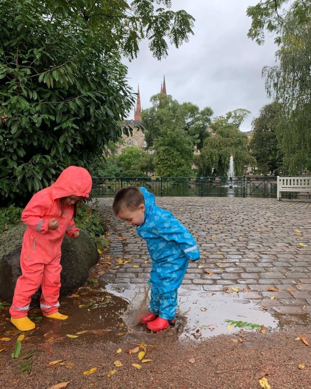 WIESBADEN, Germany-Susanna Baumann's children, wearing their rain gear, splash in the puddles in Wiesbaden. Photo provided by Susanna Baumann.