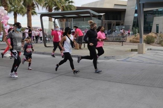 Participants of the Breast Cancer Awareness 5k Run/Walk hosted by Weed Army Community Hospital start the race October 24 on Fort Irwin, Calif. (U.S. Army photo by Kimberly Hackbarth, Weed ACH Public Affairs Office)