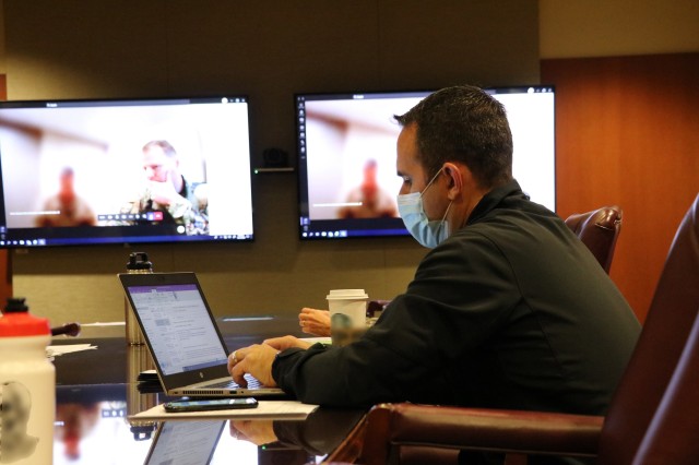 U.S. Air Force Col. Patrick Osborn, Deputy Commander for Surgical Services, Brooke Army Medical Center, prepares to answer COVID-19 questions during a video teleconference with Argentine Army doctors, Oct. 21, 2020. Osborn was part of a BAMC panel...