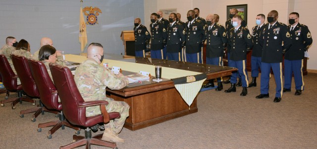 FORT LEE, VA. - Seven Instructor of the Year candidates and their sponsors listen to instructions from Command Sgt. Maj. Eric J. Vidal, Quartermaster School CSM, prior to the first event of the competition on Monday. A five-member panel of senior...
