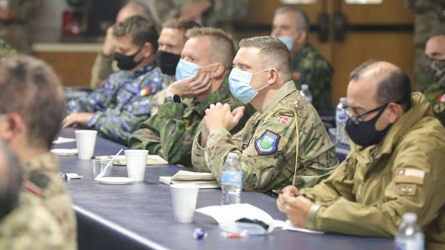 TOPEKA, Kan. – Thirty-two foreign military attachés accredited by the U.S. and posted in Washington, D.C. listen to a series of presentations about Kansas National Guard units, equipment and capabilities, history, structure, and the distinct...
