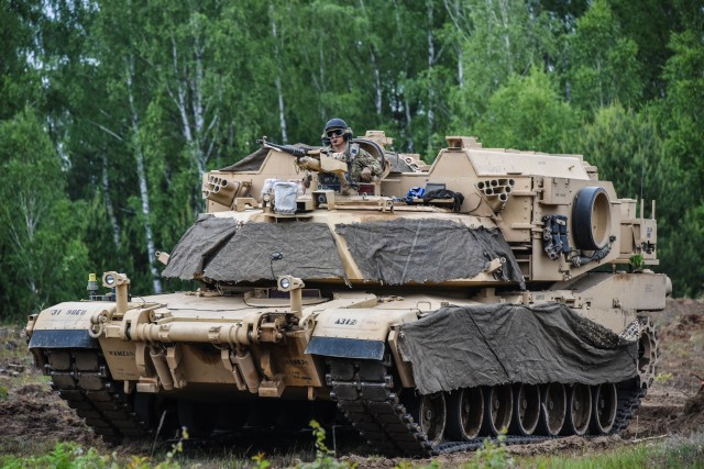 A Soldier assigned to 2nd Brigade, 3rd Infantry Division holds a fighting position during Allied Spirit at Drawsko Pomorskie Training Area, Poland, June 10, 2020. Allied Spirit was part of Defender-Europe 20, which was modified in response to...