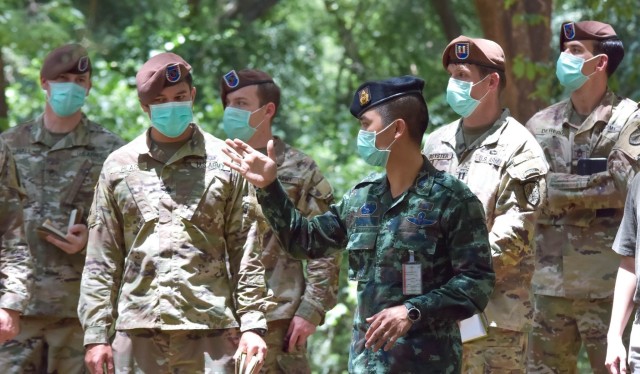 Staff Sgt. Jordan Blas, 5th Security Force Assistance Brigade team healthcare sergeant, discusses a training engagement with the Royal Thai Army’s Lt. Col. Takham Pratya, Aug. 20, 2020 at Camp Thanarat, Thailand. This engagement marked the first...