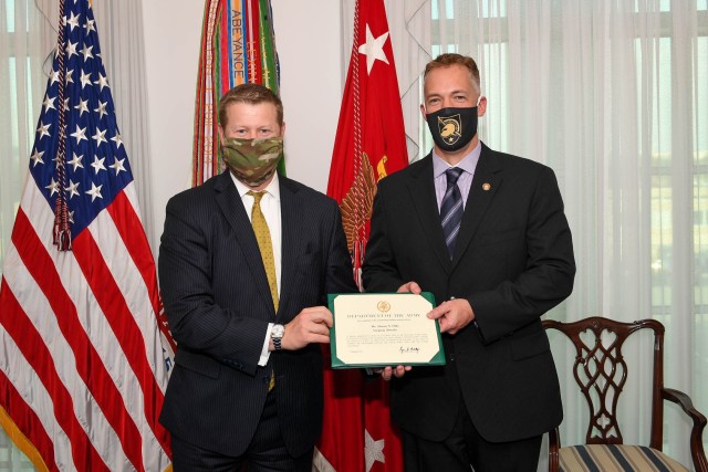 Secretary of the Army, Hon. Ryan D. McCarthy, invests in Shawn Olds as a Civilian Aide to the Secretary of the Army (CASA) for Virginia (North) at the Pentagon, in Arlington, Va., Oct. 27, 2020. (U.S. Army photo by Sgt. James Harvey)