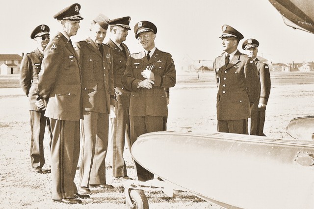 Army Gen. Hamilton Howze speaks with Maj. Gen. Bogardus Snowden &#34;Bugs&#34; Cairns, namesake of Cairns Army Airfield in the 1950s. 