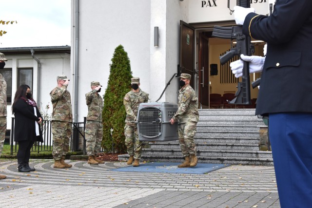 WIESABDEN, Germany - Soldiers carry the crate of military working dog Diana of the 525th Military Working Dog Detachment during a memorial ceremony in her honor Oct. 30 at the Clay Chapel. The 4-year-old patrol explosive dog (enhanced), passed...