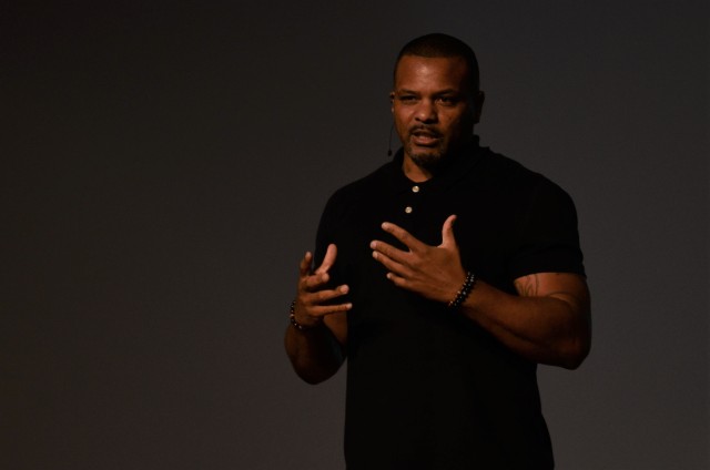 Dominique Waltower, motivational speaker and life development coach, speaks during a Domestic Violence Awareness month event Oct. 30 in Carey Theater on Joint Base Lewis-McChord.