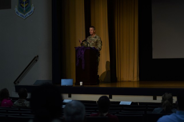 Col. Skye Duncan, JBLM Garrison commander, speaks during a Domestic Violence Awareness month event Oct. 30 in Carey Theater on Joint Base Lewis-McChord.