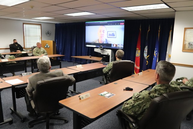 Assistant Secretary of the Navy (Manpower and Reserve Affairs) Catherine Kessmeier and Vice Adm. John Nowell, Jr., Chief of Naval Personnel (CNP), participate in a socially distanced meeting with Fort McCoy Deputy to the Garrison Commander Brad...