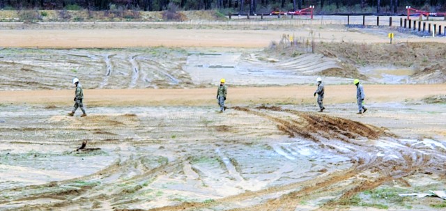 Soldiers at Fort McCoy, Wis., for training in the Regional Training Site-Maintenance Wheeled-Vehicle Recovery Operations Course work together during training Oct. 23, 2020, at the installation Vehicle Recovery Site on North Post. The 17-day course...