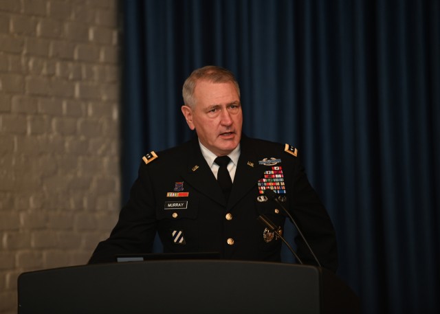 Gen. Mike Murray, Commanding General of Army Futures Command, administers the Oath of Office to Lt. Gen. D. Scott McKean after his promotion at Camp Mabry, Texas, Nov. 2, 2020. Following the promotion, McKean assumed responsibilities as Deputy Commanding General, Army Futures Command and Director, Futures and Concepts Center. (U.S. Army photo by David Miller)