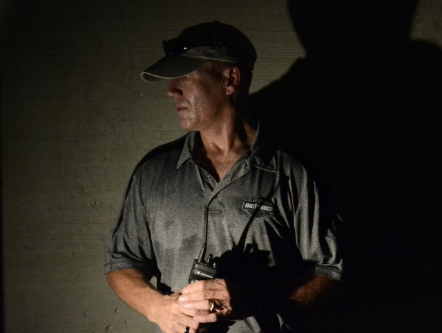 Wolf Amacker, Fort Bragg Installation Range officer, explains the barriers and obstacles that wait for warriors as they traverse the subterranean training facility.