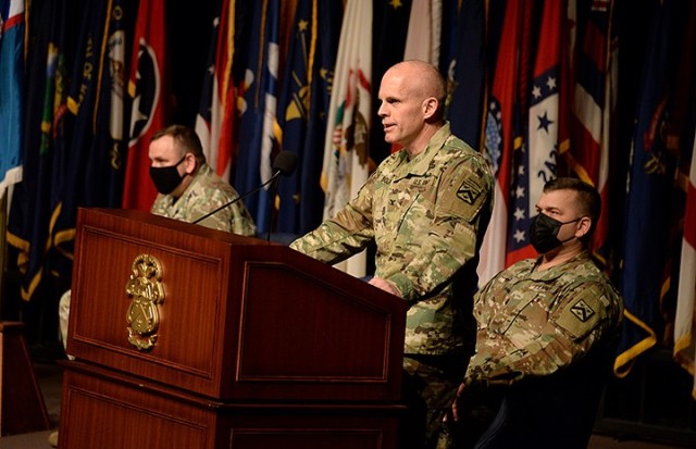 Combined Arms Center Chief of Staff Col. Thomas Bolen delivers remarks during the change of command ceremony for outgoing Special Troops Battalion Commander Lt. Col. Charles D. Ausman and incoming STB Commander Lt. Col. Mark Winker Oct. 30 at the...