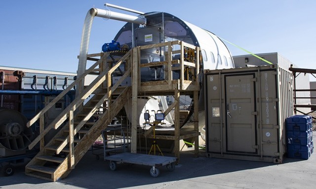 
Entry to the section of a passenger jet, where the effectiveness of current practices of decontamination against SARS-CoV-2 that causes the COVID-19 disease will be tested.
Testing will begin in mid November at Dugway Proving Ground and continue into March, 2021.  