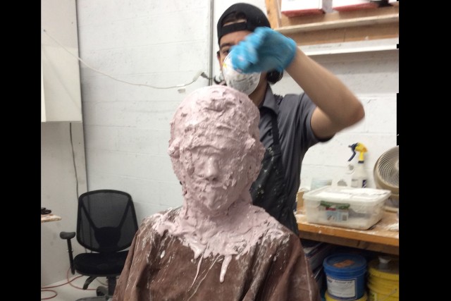 Lt. Col. Ashley Hartwell, a reservist, participates in the casting process for a life-sized model in her visage on display at the National Museum of the U.S. Army, in Fort Belvoir, Va. The model, titled &#34;Corporal on Patrol in Ramadi,&#34; highlights the growing role of women in combat during the wars in Iraq and Afghanistan. 