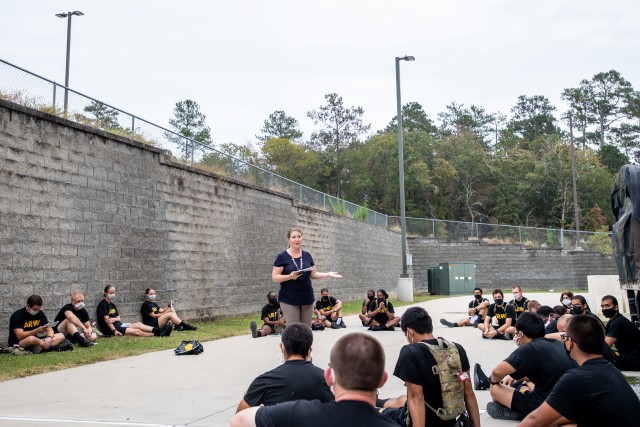 Dr. Treva Anderson, give trainees with 3rd Battalion, 34th Infantry Regiment a briefing on mindfulness training on Oct. 28.