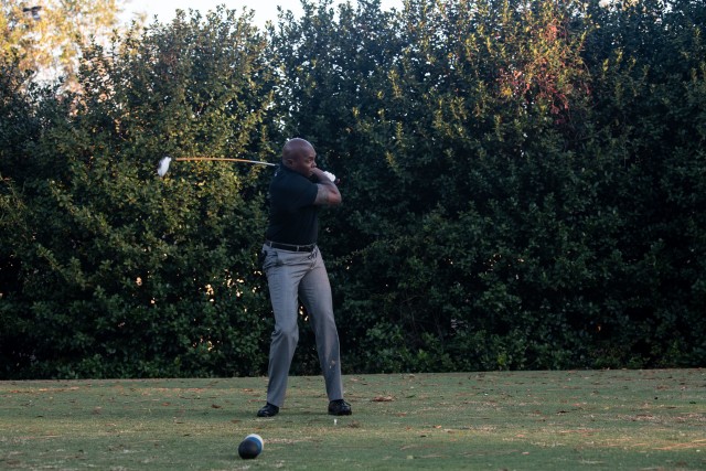 Post Command Sgt. Maj. Philson Tavernier takes his first swing of the day during the CG’s Scramble on Oct. 30.