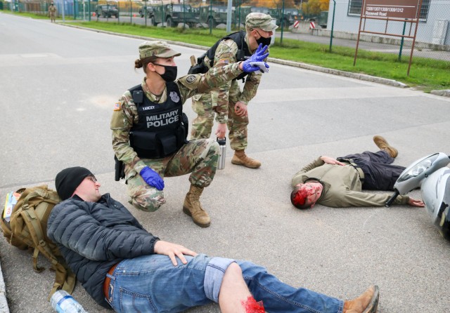 Spc. Leah Yancey, a military police Soldier with the 29th Military Police Company, Maryland Army National Guard, gives instructions during a mass casualty training event at the Joint Multinational Readiness Training Center in Hohenfels, Germany,...