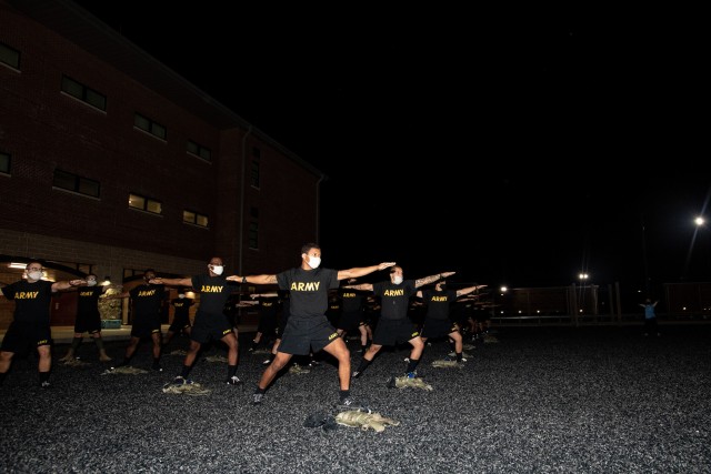 Trainees with 3rd Battalion, 34th Infantry Regiment participate in yoga training on Oct. 29.