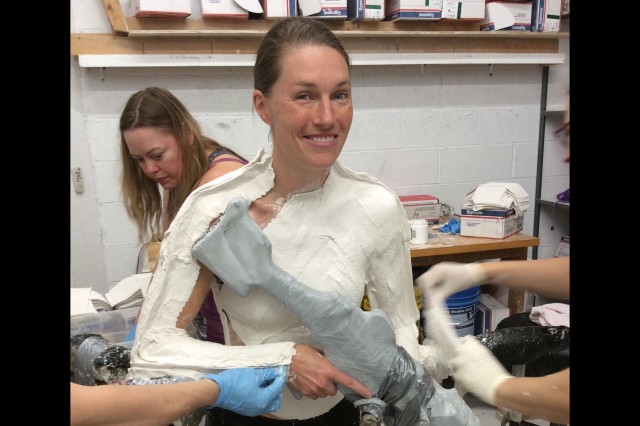 Lt. Col. Ashley Hartwell, a reservist, participates in the casting process for a life-sized model in her visage on display at the National Museum of the U.S. Army, in Fort Belvoir, Va. The model, titled &#34;Corporal on Patrol in Ramadi,&#34; highlights the growing role of women in combat during the wars in Iraq and Afghanistan. 