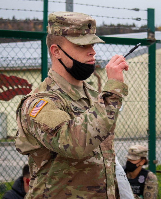 Spc. Garrett Moats, a combat medic specialist with 566th Area Support Medical Company, 61st Medical Battalion based out of Fort Hood, Texas, steps up as triage leader during a Joint Multinational Readiness Center Rotation in Hohenfels, Germany, on Nov. 4, 2020. The 566th ASMC is completing the JMRC rotation to prepare for its mobilization to KFOR 28 in support of Operation Joint Guardian. The NATO organization ensures freedom of movement and a safe and secure environment for all people in Kosovo. (U.S. Army National Guard photo by Sgt. Jonathan Perdelwitz)