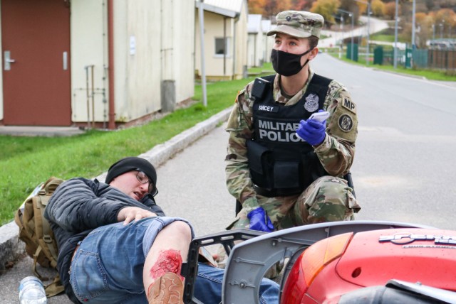 Spc. Leah Yancey, a military police Soldier with the 29th Military Police Company, Maryland Army National Guard, gives instructions during a mass casualty training event at the Joint Multinational Readiness Training Center in Hohenfels, Germany,...