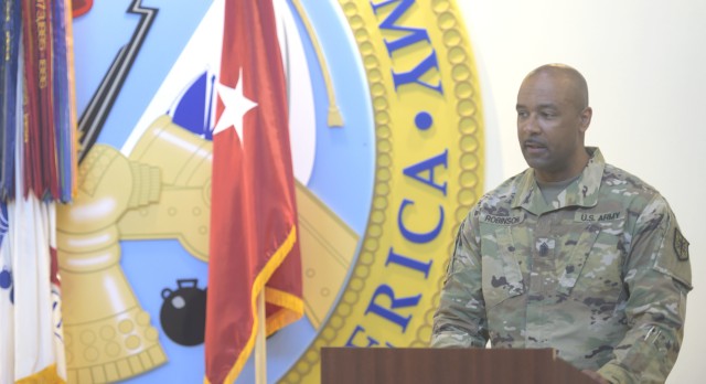 Command Sgt. Maj. Michael J. Robinson, outgoing Command Sergeant Major, Military Intelligence Readiness Command (MIRC), speaks during the Military Intelligence Readiness Command change of responsibility ceremony at Fort Bragg, North Carolina, September 11, 2020. Key guests included, Maj. Gen. A.C. Roper, Deputy Commanding General U.S. Army Reserve Command, Brig. Gen. Robert S. Cooley Jr., Army Reserve Command Chief of Staff, Brig. Gen. Aida T. Borras, Commanding General, Military Intelligence Readiness Command and Chief Warrant Officer 5 Harold (Hal) Griffin III, Command Chief Warrant Officer, U.S. Army Reserve Command (U.S. Army Reserve photo by Staff Sgt. Edgar Valdez)