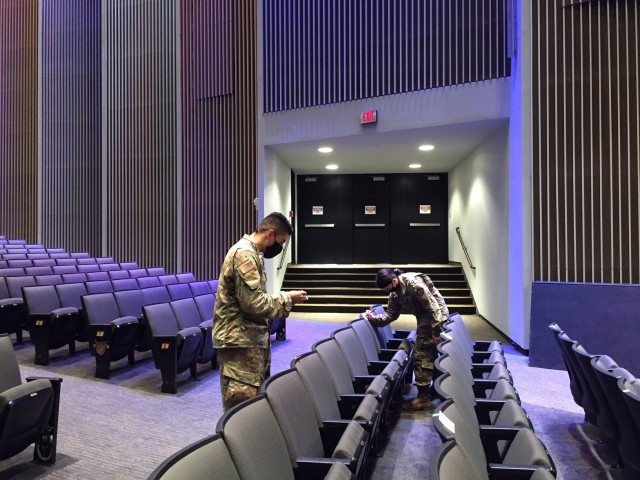 USMA Class of 2022 Cadet Andy Rodriguez, left, and Class of 2024 Cadet Emily Hobbs, right, mark off seats in Eisenhower Hall Theatre Sept. 10 ahead of the "We Stand Together" concert at the U.S. Military Academy at West Point featuring Platinum...