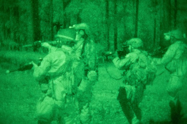 FORT POLK, La. – Soldiers with 1st Special Forces Group (Airborne) move toward an objective during a training exercise at Fort Polk, Louisiana, Oct. 26, 2020. U.S. and Thai special operations forces trained together from October 14-27 during the Joint Readiness Training Center (JRTC) rotation 21-01 to enhance both tactical knowledge and partnership. (U.S. Army photo by Pfc. Thoman Johnson)