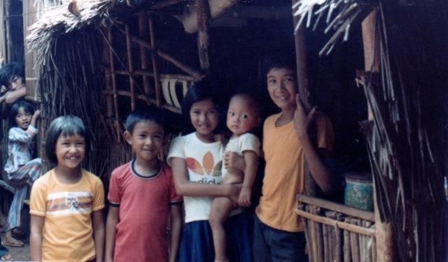 Lan Dalat (right) with family and a friend in the Vietnamese Refugee Camp, Palawan Philippines.