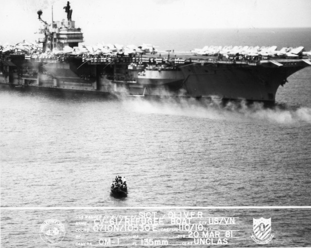 The crew of the USS Ranger CV-61 rescued all 138 of the ‘boat people’ from the wooden boat drifting on the South China Sea.