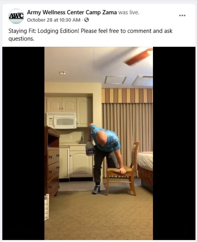 Stephen Harmon, a health promotion technician for the Camp Zama Army Wellness Center, demonstrates how to work out in a hotel room with limited equipment at Camp Zama Lodging, Camp Zama, Japan, Oct. 28.