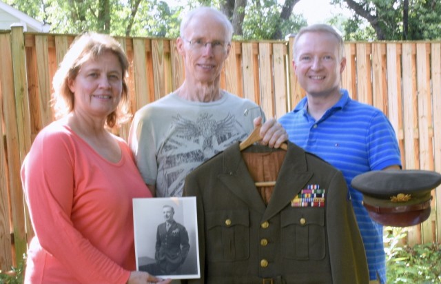 Members of the Gervais family pose with the uniform of Royal Gervais, which was returned to them through the efforts of Ann Siegel and some online help. In 1916, Royal Gervais joined the Army and served during World War I as an infantry officer...
