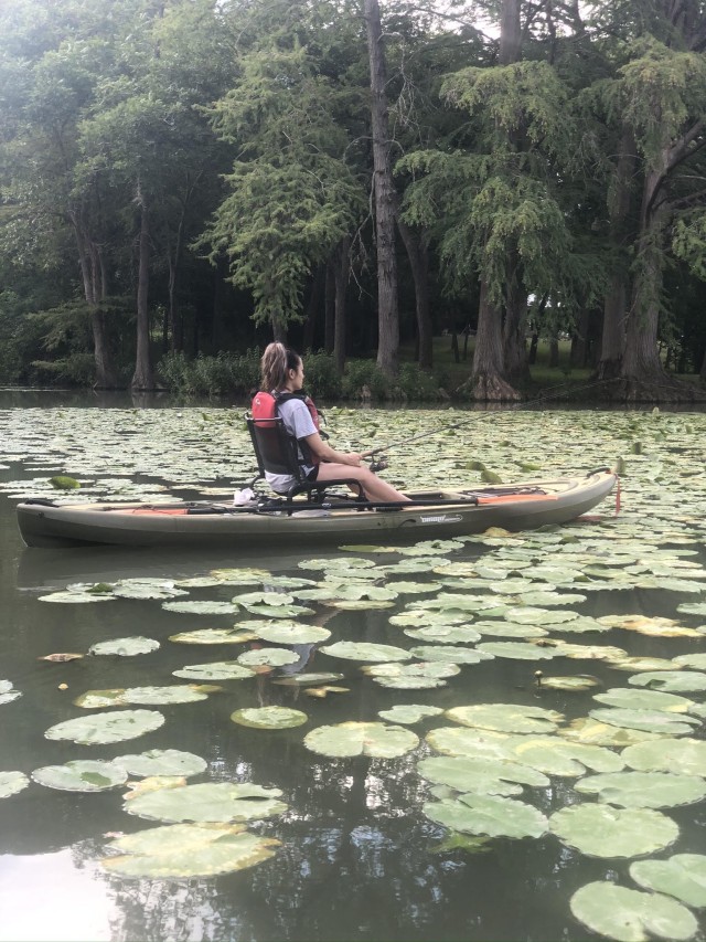 Participants enjoy a kayak fishing event on August 8, 2020, on the Guadalupe River at the Lazy U Ranch in Seguin, Texas. (Credit: Angel Flores)